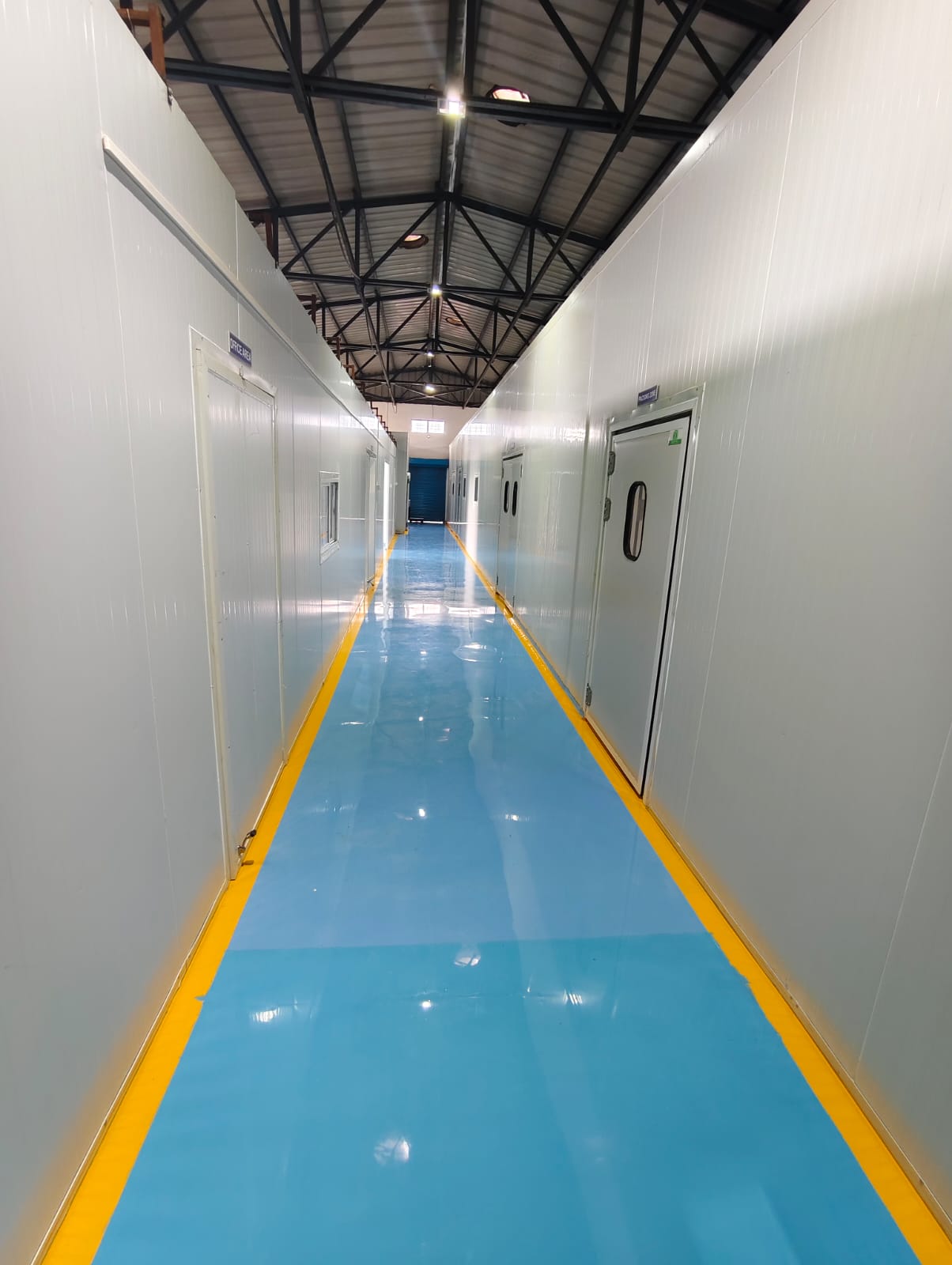 Clean corridor between insulated processing rooms at the Raisa Foods facility